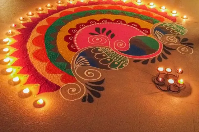 Rangoli With Diyas and Candles Picture
