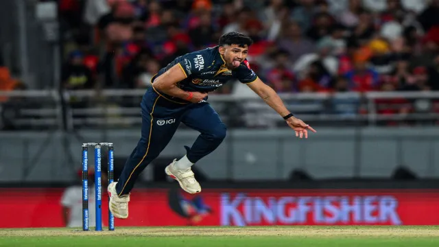 Who is Ashok Sharma, who bowled the