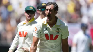 Mitchell Starc claims a
